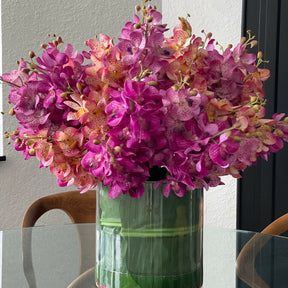 Mixed Mokara Orchids in Large Rotating Cylinder