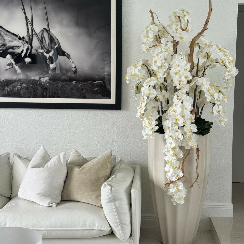 San Jose Vase in sandy Beige with white orchids in waterfall design