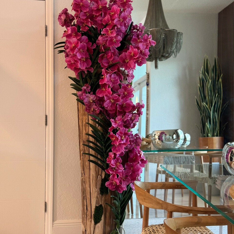 Large teak vase with natural edges and pink Vanda orchids