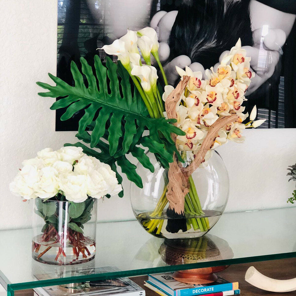 Lunar vase with cymbidiums and callas